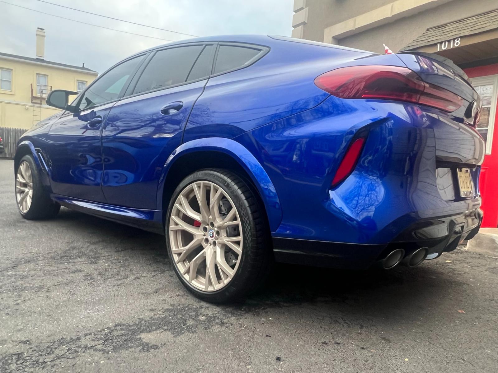 2022 Blue /Red/Black BMW X6 M Base (5YMCY0C07N9) with an 4.4L V8 DOHC 32V engine, 8A transmission, located at 1018 Brunswick Ave, Trenton, NJ, 08638, (609) 989-0900, 40.240086, -74.748085 - Holy Cow and Wow!!...That is the description on this absolutely stunning BMW X6 M Competition! Ordered by Anthony himself with the best color choice of Marina Bay Blue metallic and Red Interior to stand out on the road and to any enthusiast of the BMW X series! Executive Pkg. includes Remote Start, - Photo #3